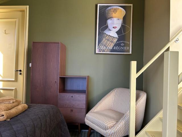 Postel nebo postele na pokoji v ubytování Hotel Stadsherberg Sneek