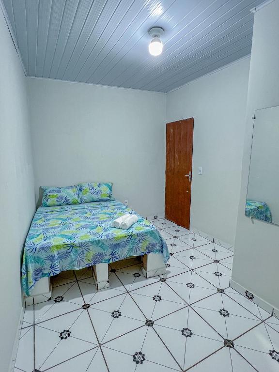 Postel nebo postele na pokoji v ubytování Pousada Sempre Viva Lençóis