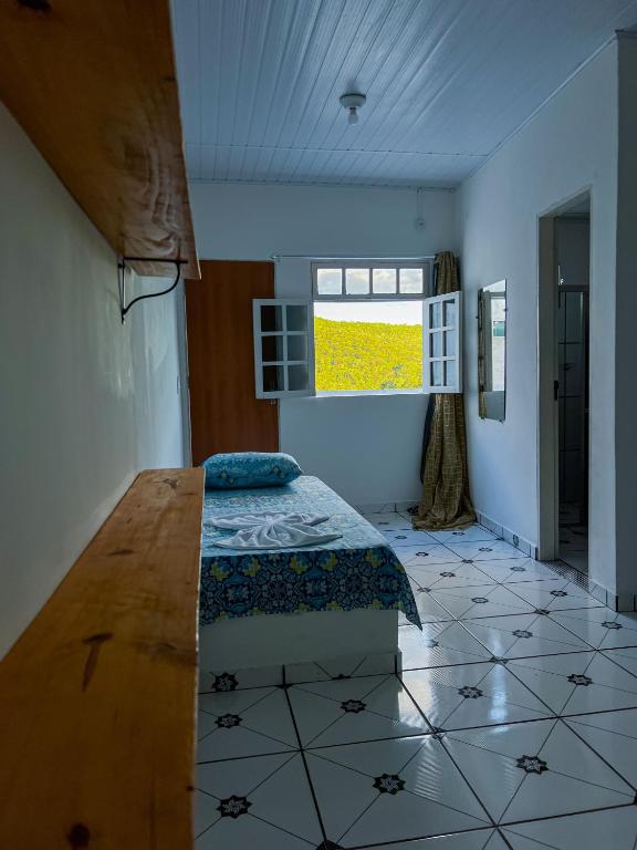 Postel nebo postele na pokoji v ubytování Pousada Sempre Viva Lençóis