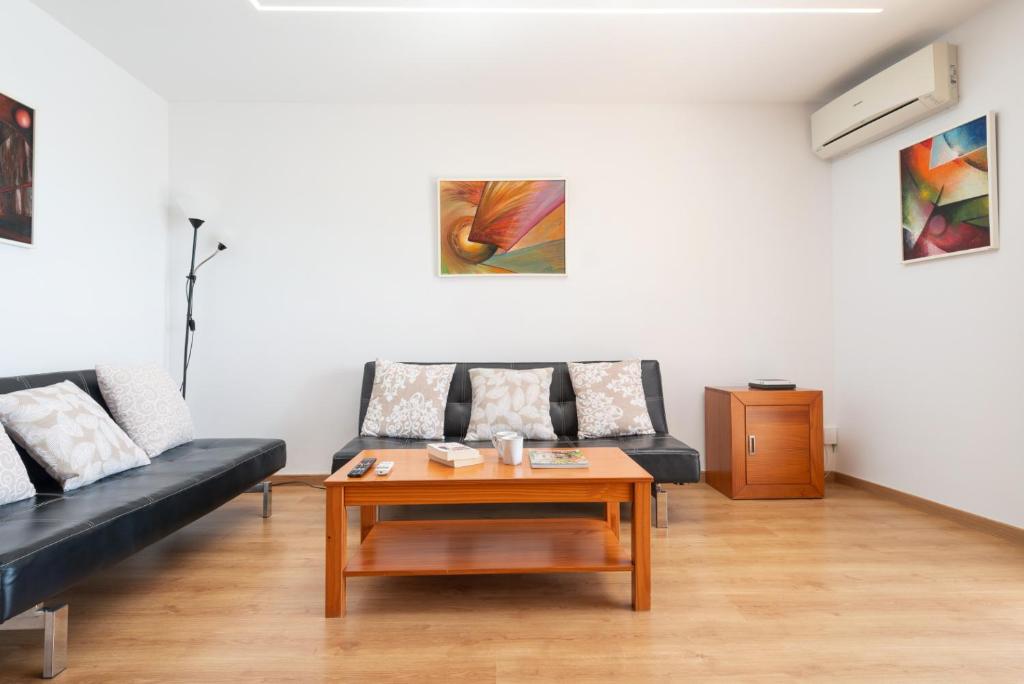 A seating area at Apartment Antonia - Alcúdia