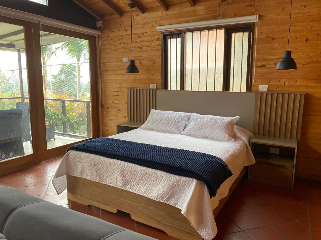 Postel nebo postele na pokoji v ubytování Finca Hotel 12 Palmas- Aeropuerto JMC