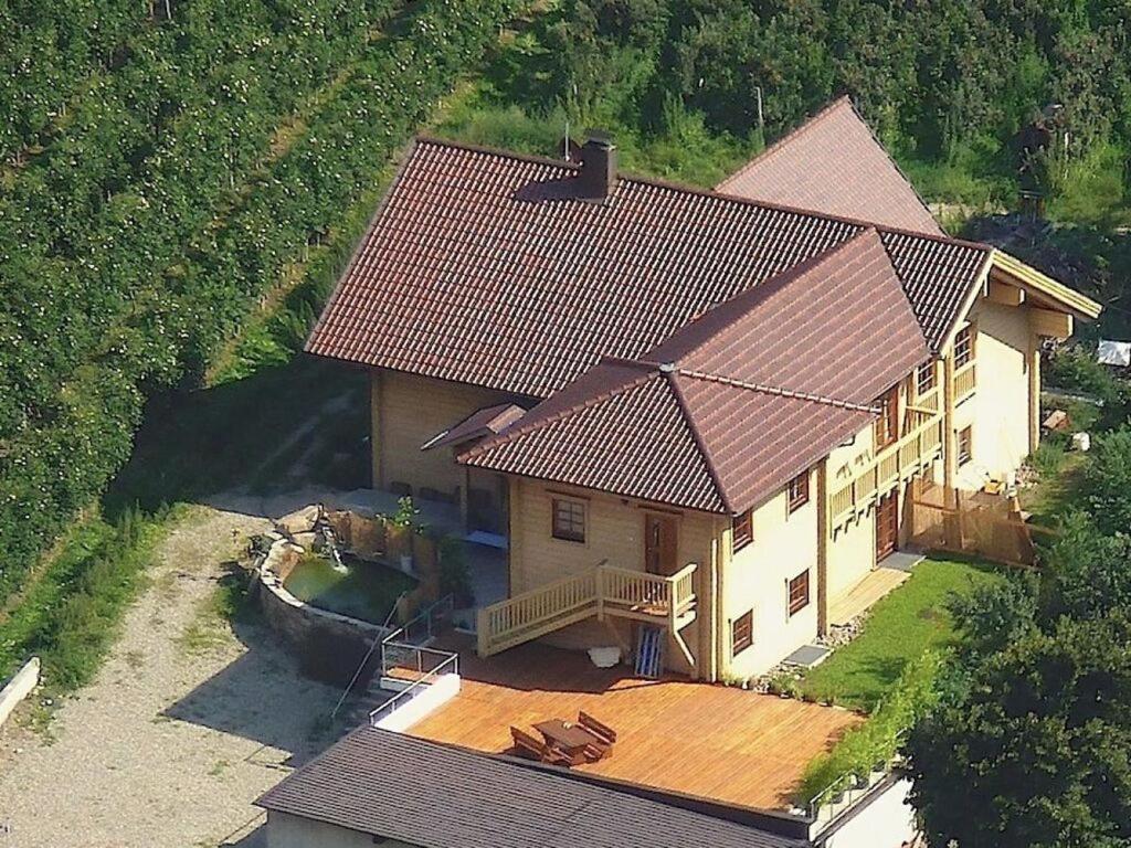 an aerial view of a house with a deck at Holiday apartment Kleinlehenhof in Naturno