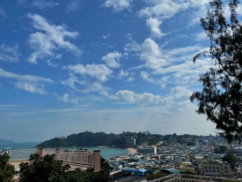 a view of a city with a body of water at ChillOut in Cheung Chau in Hong Kong