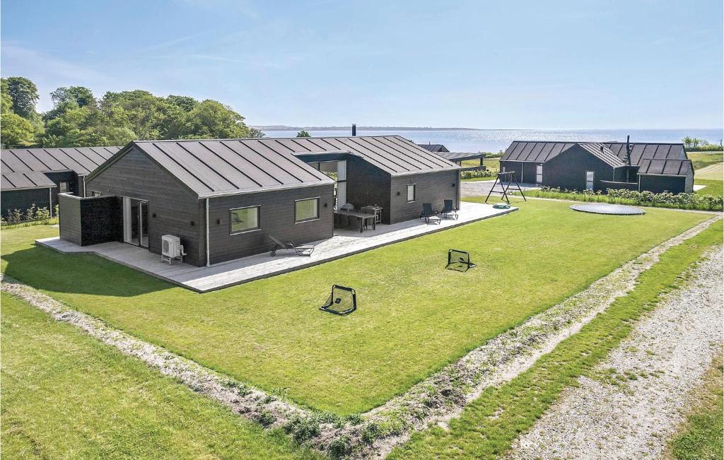 an aerial view of a house with a yard at Four-Bedroom Holiday Home In Haderslev in Haderslev
