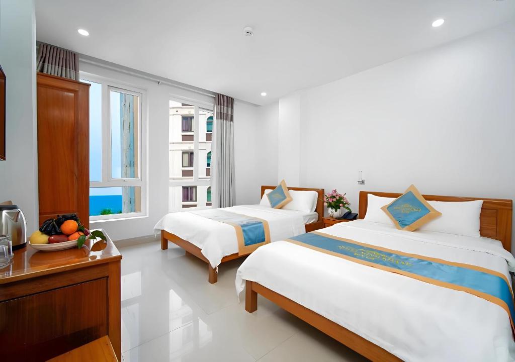 Voodi või voodid majutusasutuse Mặt Trời Tím Hotel & Spa toas
