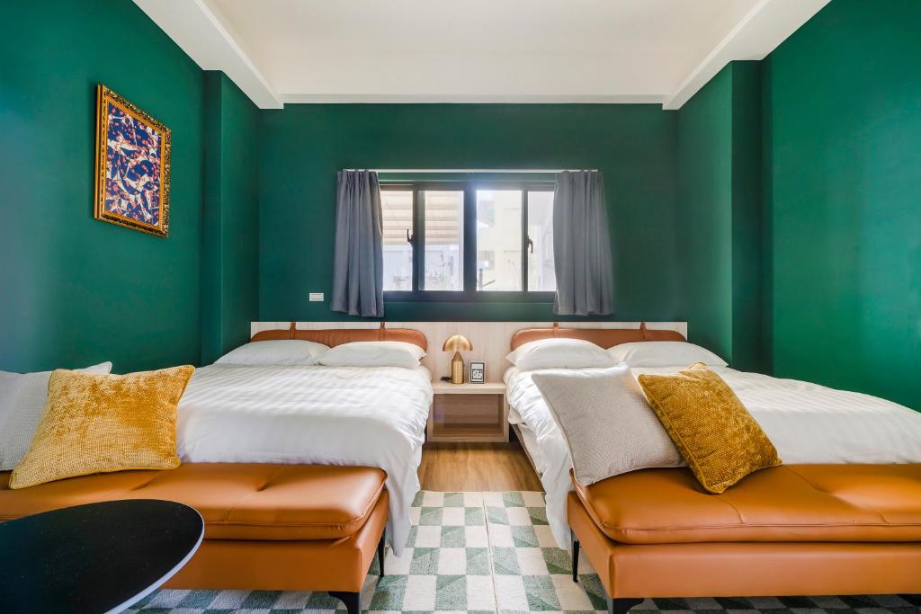 Postel nebo postele na pokoji v ubytování Chill Style Inn