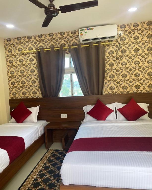 Кровать или кровати в номере Hotel Safari Suite