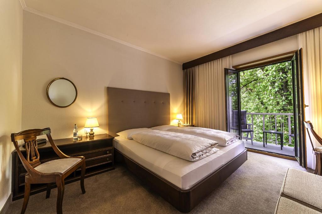 Postel nebo postele na pokoji v ubytování Hotel Isabella