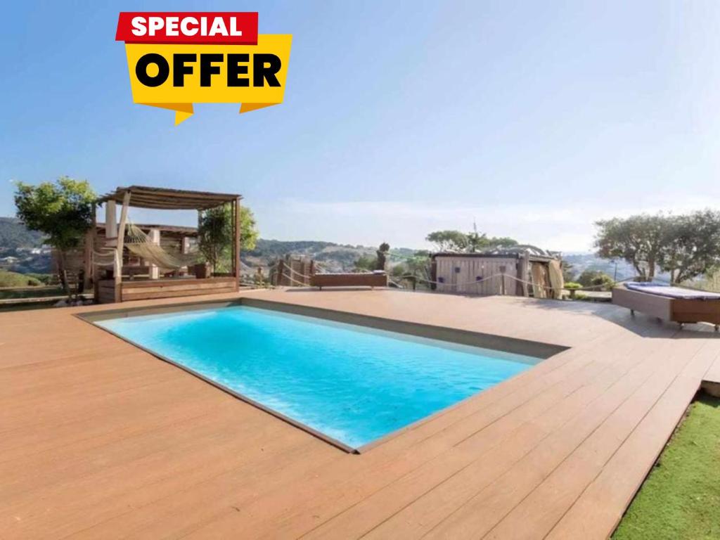 an offer on a house with a swimming pool at Villa Carrasca l Sea View l Pool l BBQ l ChillOut by Turyhost in Arenys de Munt