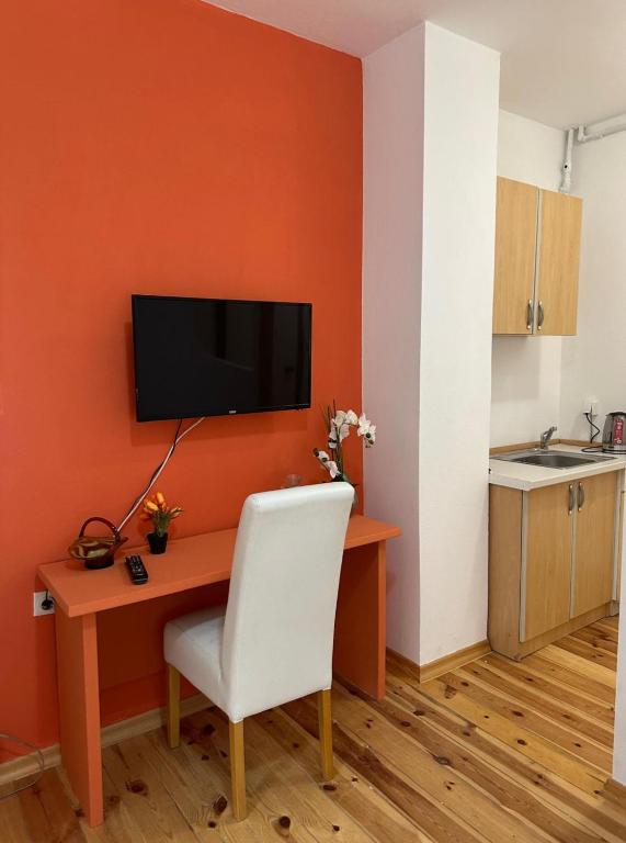 Kuchyň nebo kuchyňský kout v ubytování Themis Apart Hotel