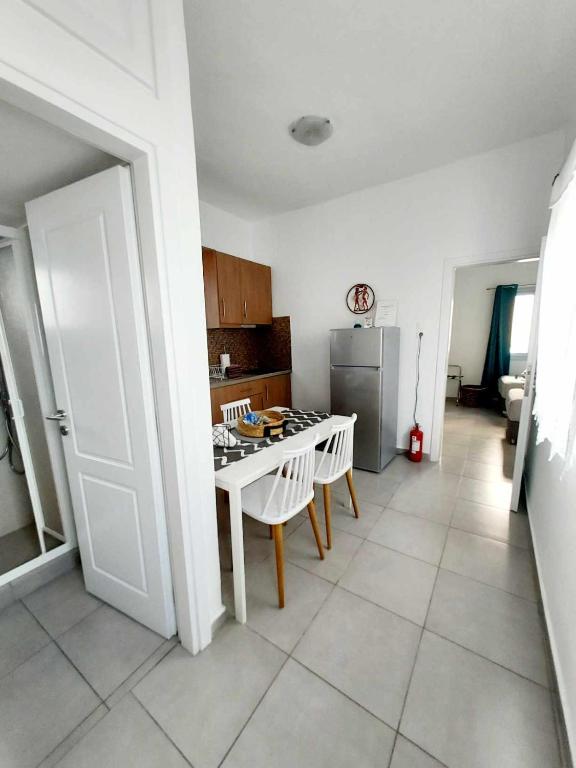 Kuchyň nebo kuchyňský kout v ubytování Folia Apartments