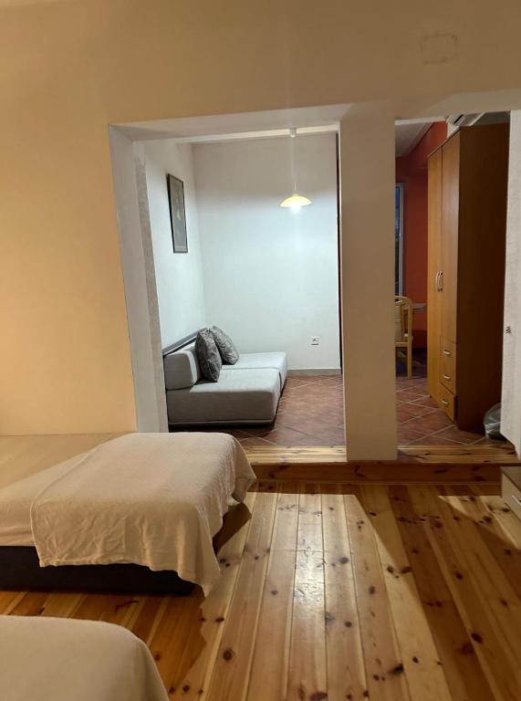 Postel nebo postele na pokoji v ubytování Themis Apart Hotel