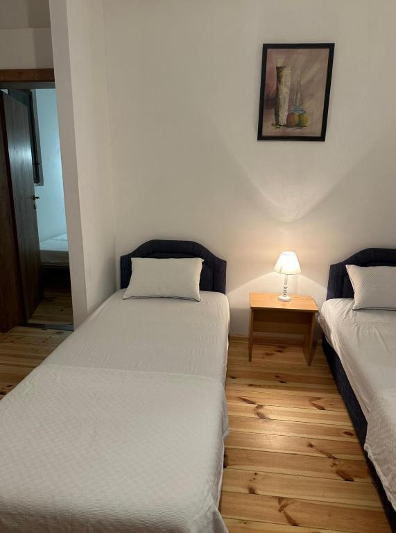 Postel nebo postele na pokoji v ubytování Themis Apart Hotel