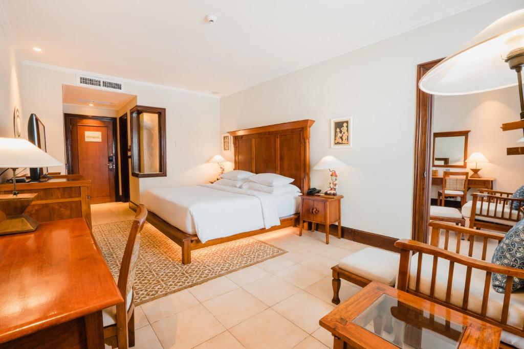 Postel nebo postele na pokoji v ubytování Ramayana Suites and Resort