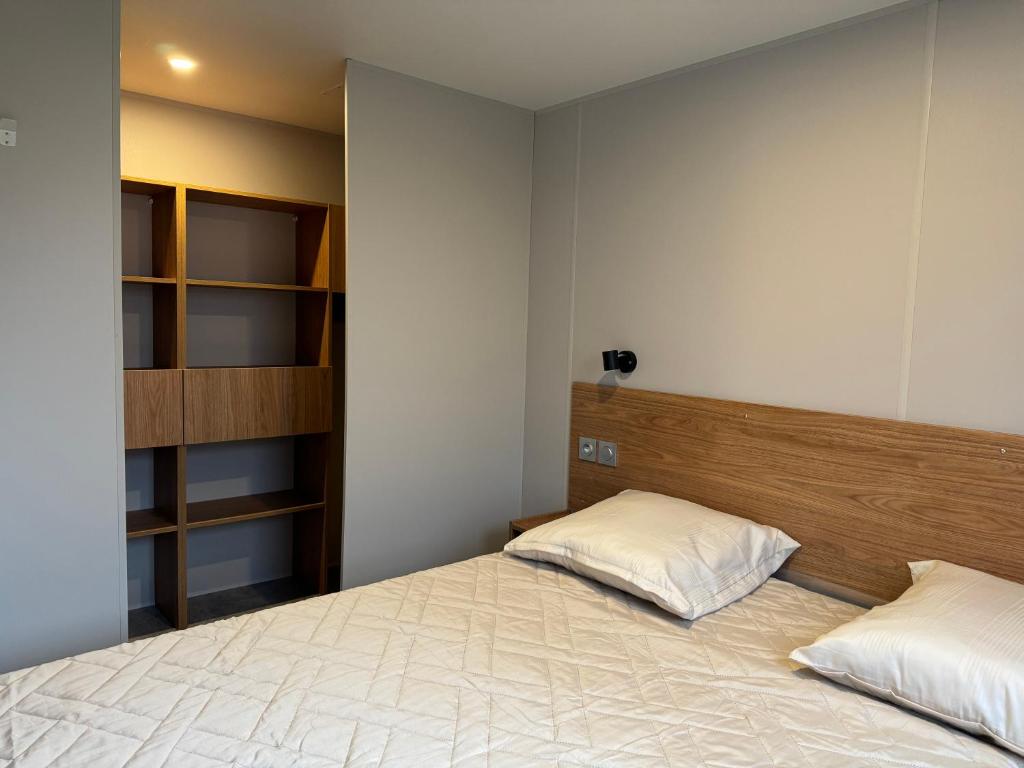 Postel nebo postele na pokoji v ubytování Beachside Vakantiepark