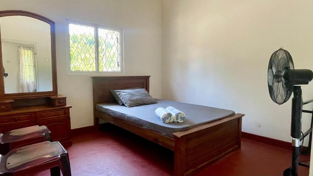Voodi või voodid majutusasutuse Cabin Unambuwa toas