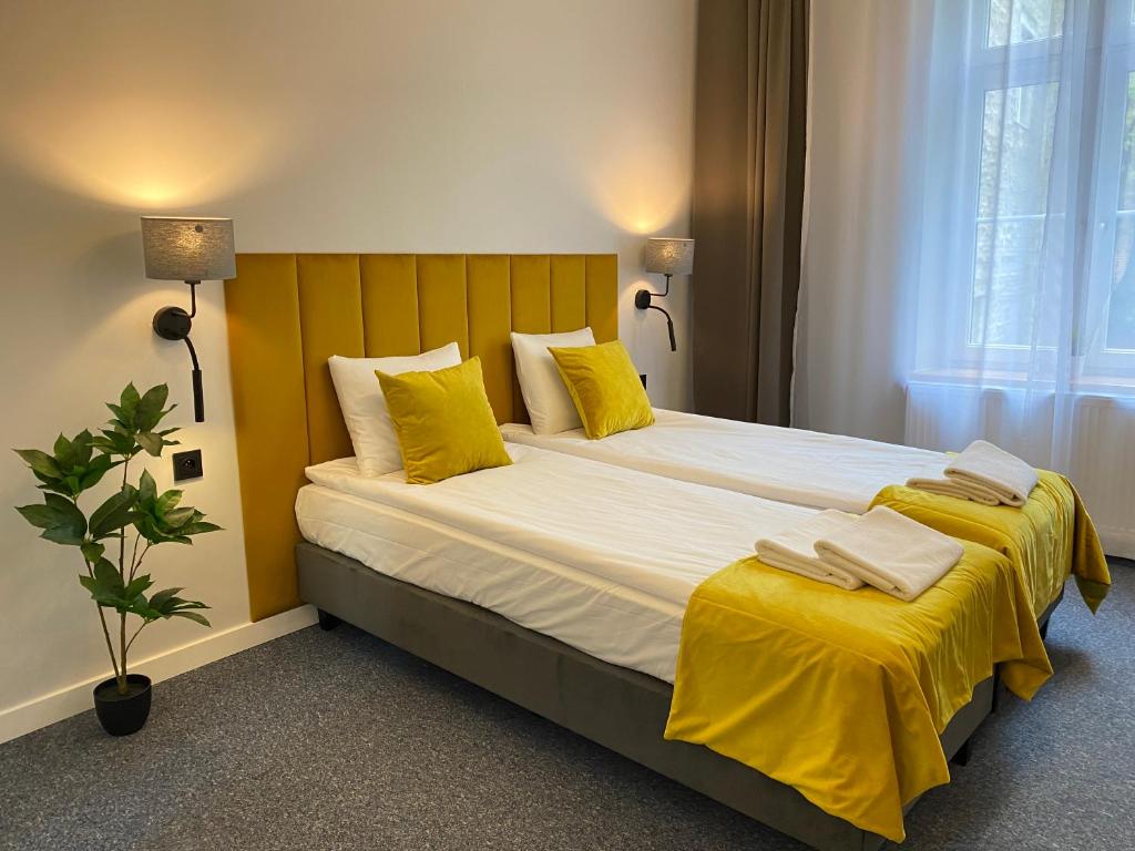 Posteľ alebo postele v izbe v ubytovaní Old Town Residence Bis