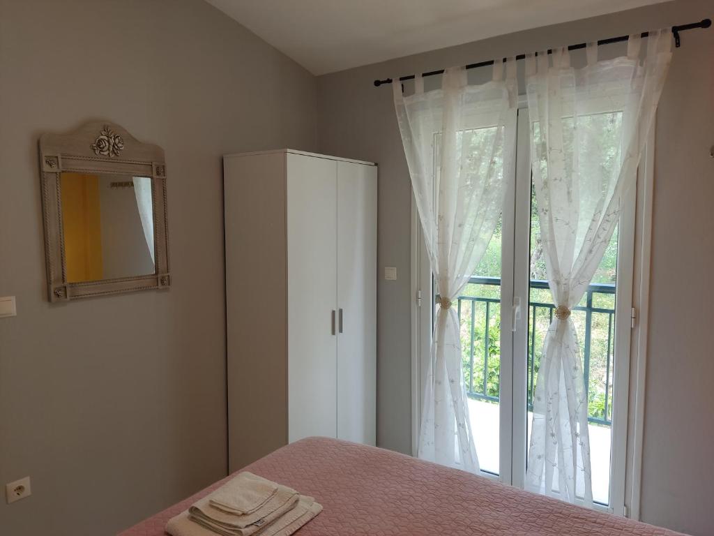 Posteľ alebo postele v izbe v ubytovaní Blue & Green Apartments , Dassia - Corfu 1&2-3&4
