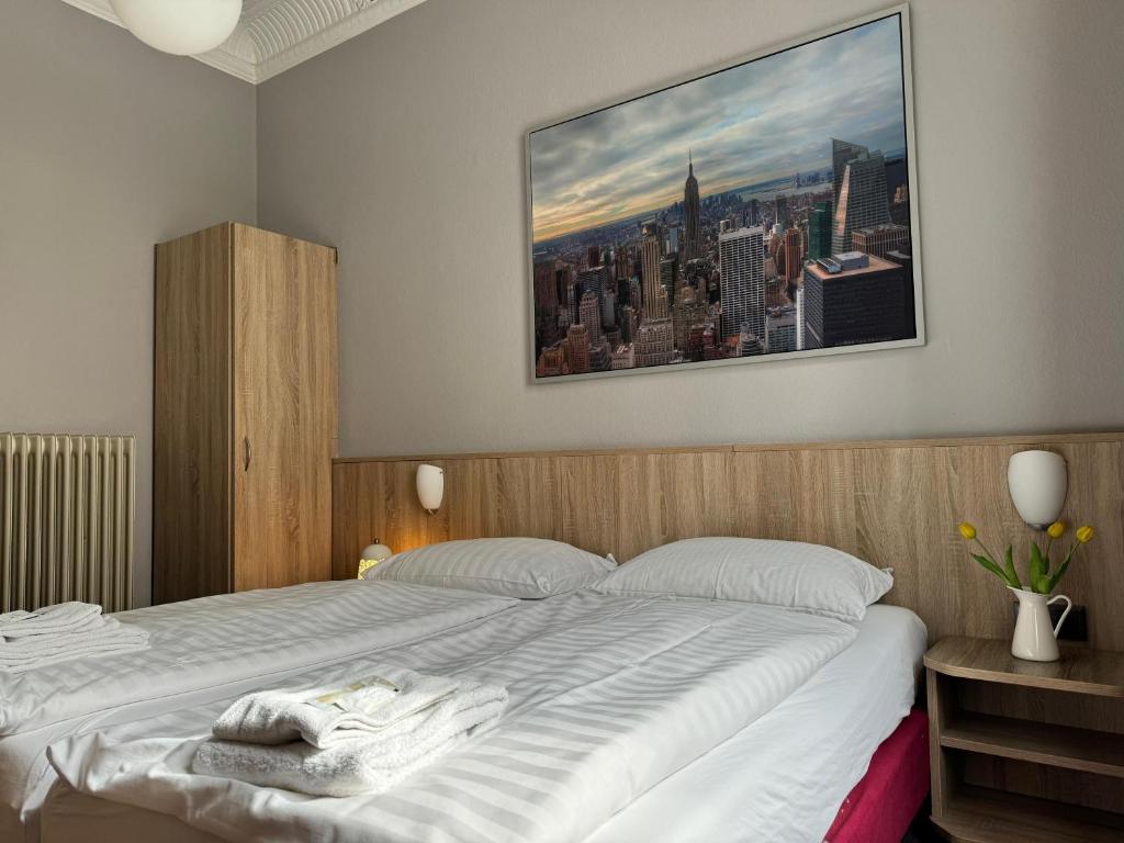 Postel nebo postele na pokoji v ubytování Hotel Kieler Hof am Hauptbahnhof - Hamburg Central Station
