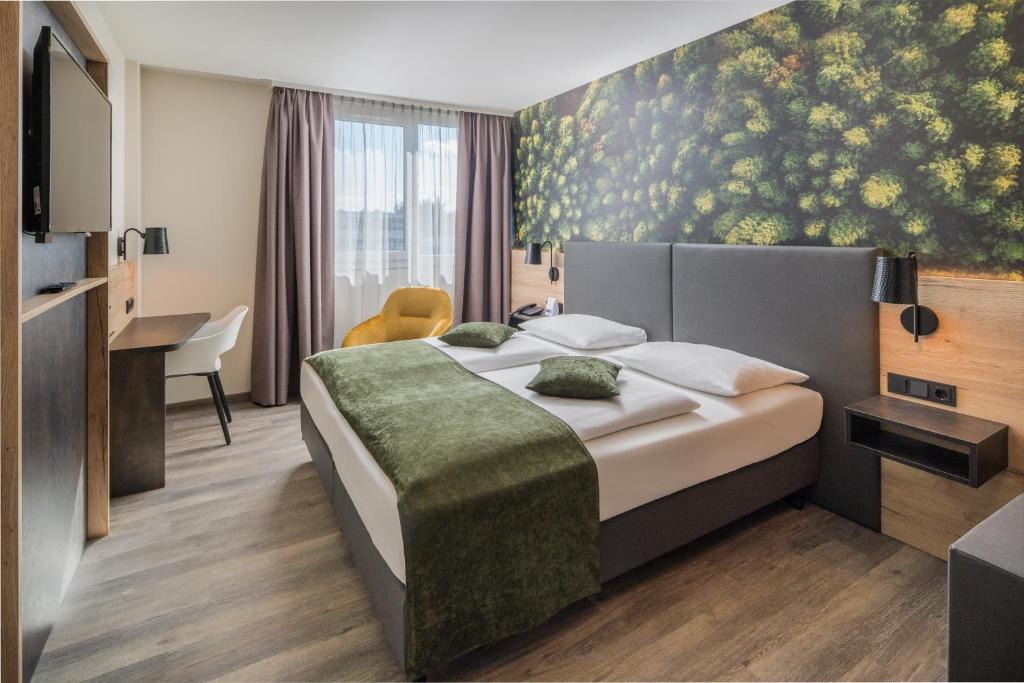 Postel nebo postele na pokoji v ubytování Best Western Hotel München Airport