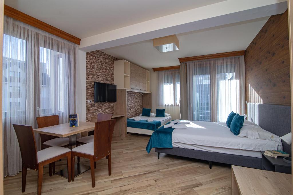 Postel nebo postele na pokoji v ubytování Central Inn