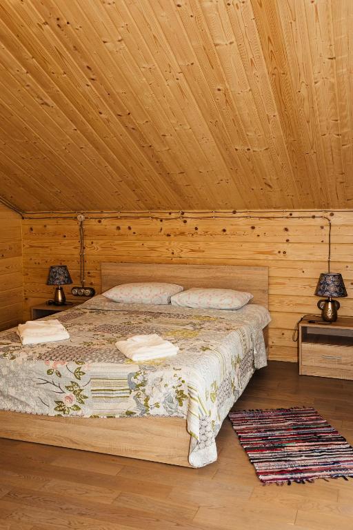 Postel nebo postele na pokoji v ubytování Готель Logindariy