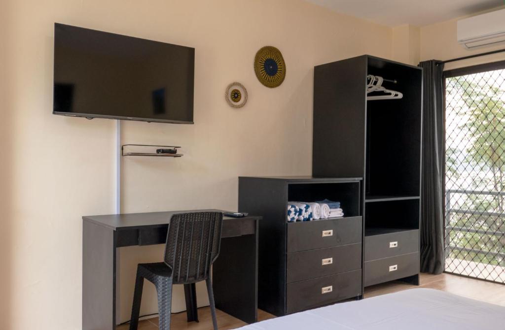 TV a/nebo společenská místnost v ubytování Masayahin Cabanavillas