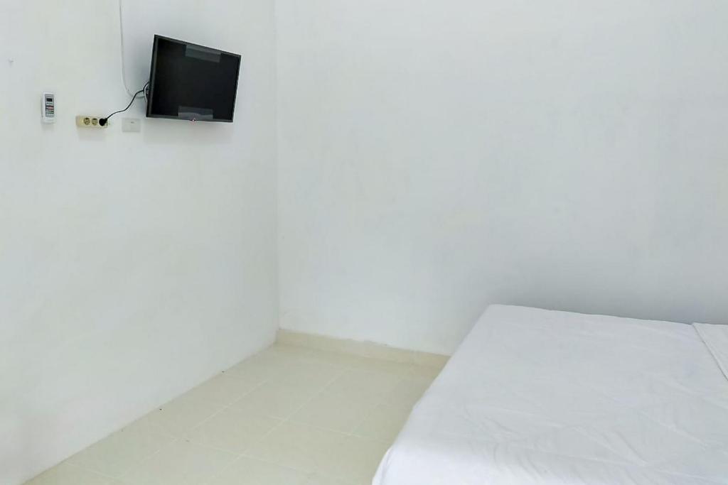 Wisma Silampari Mitra RedDoorz - Standard Double Room