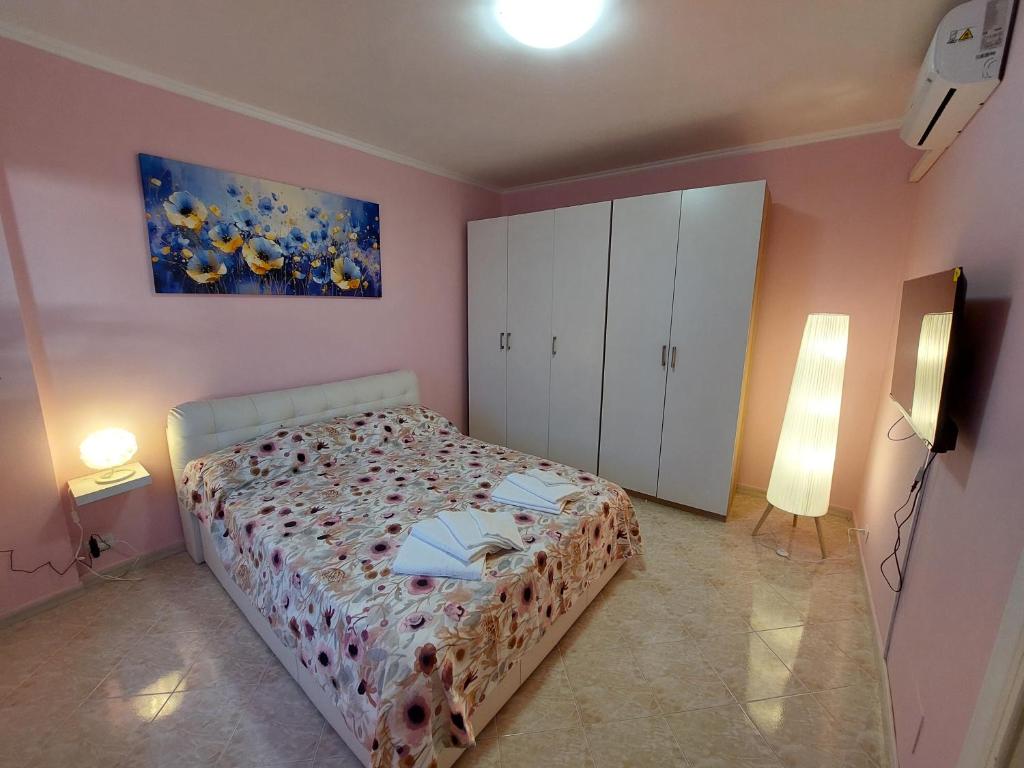Postel nebo postele na pokoji v ubytování SWEETY LELE HOUSE