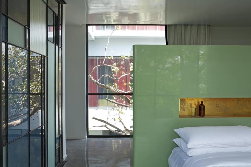 Postel nebo postele na pokoji v ubytování Casa Habita, a Member of Design Hotels