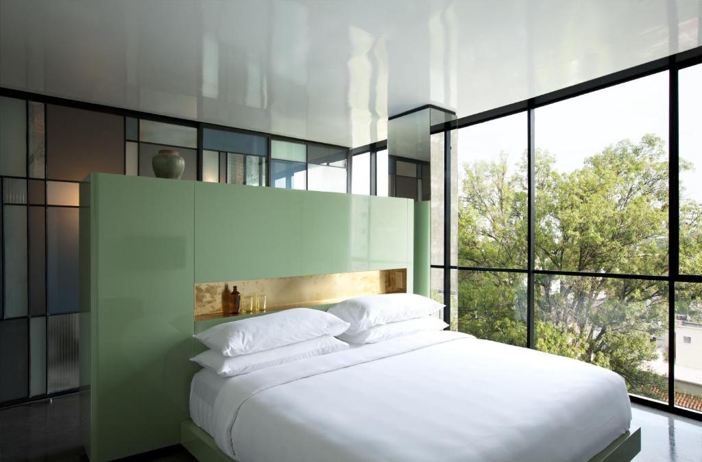 Postel nebo postele na pokoji v ubytování Casa Habita, a Member of Design Hotels
