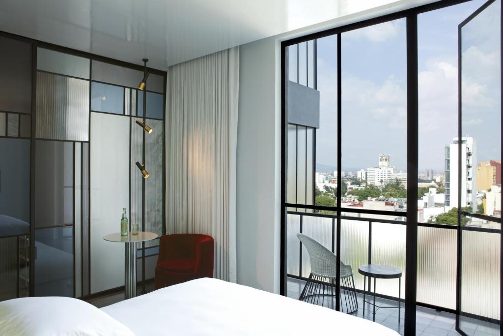 Postel nebo postele na pokoji v ubytování Casa Habita, a Member of Design Hotels