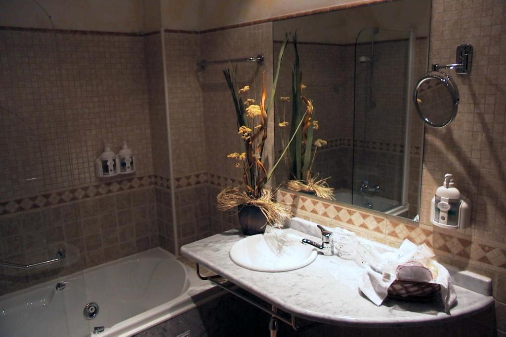 Kúpeľňa v ubytovaní Hotel Santiago