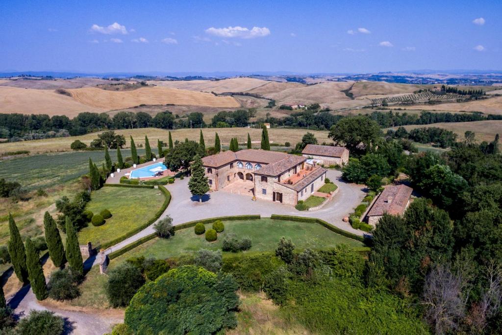 an aerial view of a estate with a pool at Villa Asciano 20 by Mmega in Trequanda