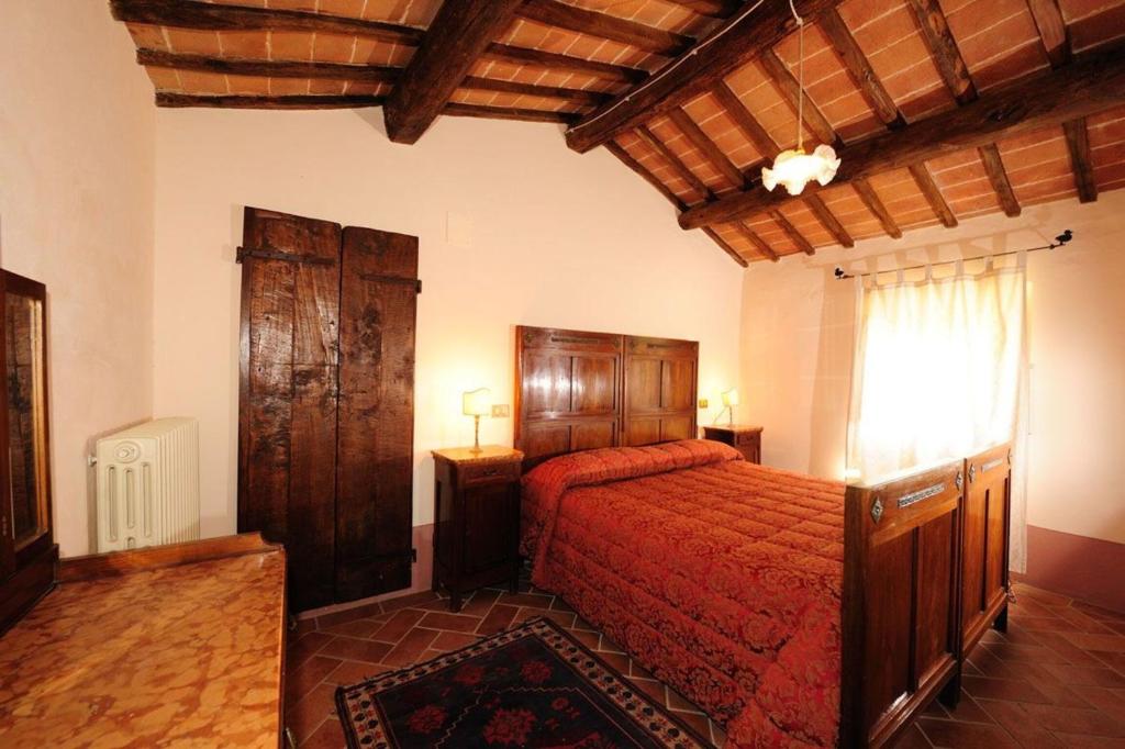 Posteľ alebo postele v izbe v ubytovaní Casa Maria Nuova