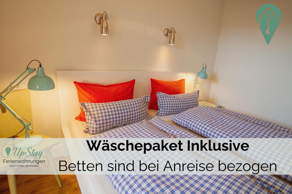 Postel nebo postele na pokoji v ubytování Friesenherz - Memmert