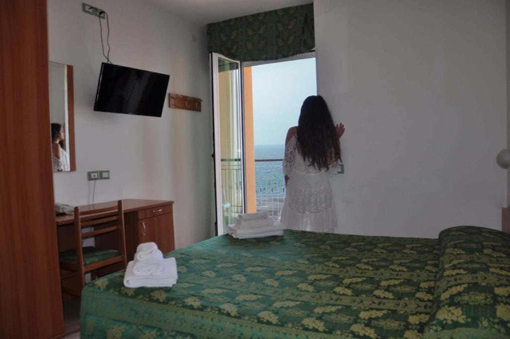Postel nebo postele na pokoji v ubytování Hotel Belvedere