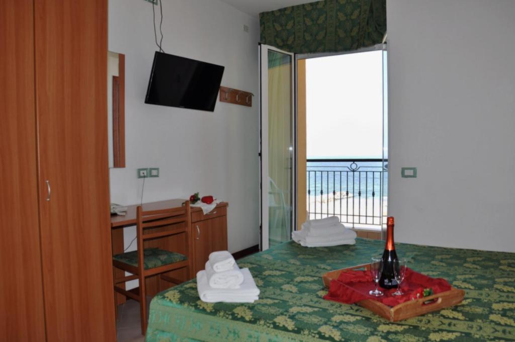 Postel nebo postele na pokoji v ubytování Hotel Belvedere