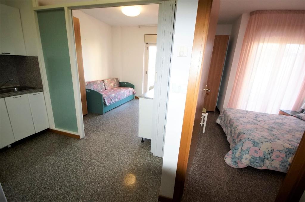 Postel nebo postele na pokoji v ubytování Complesso Cherubini