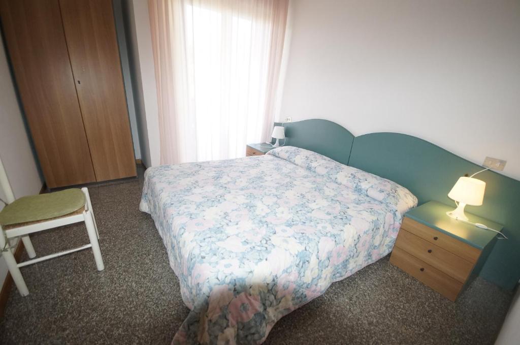 Postel nebo postele na pokoji v ubytování Complesso Cherubini