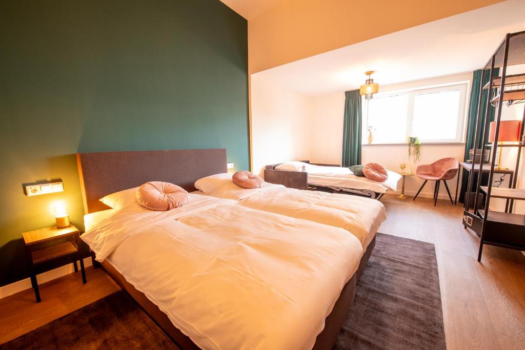 Postel nebo postele na pokoji v ubytování Hotel Bom