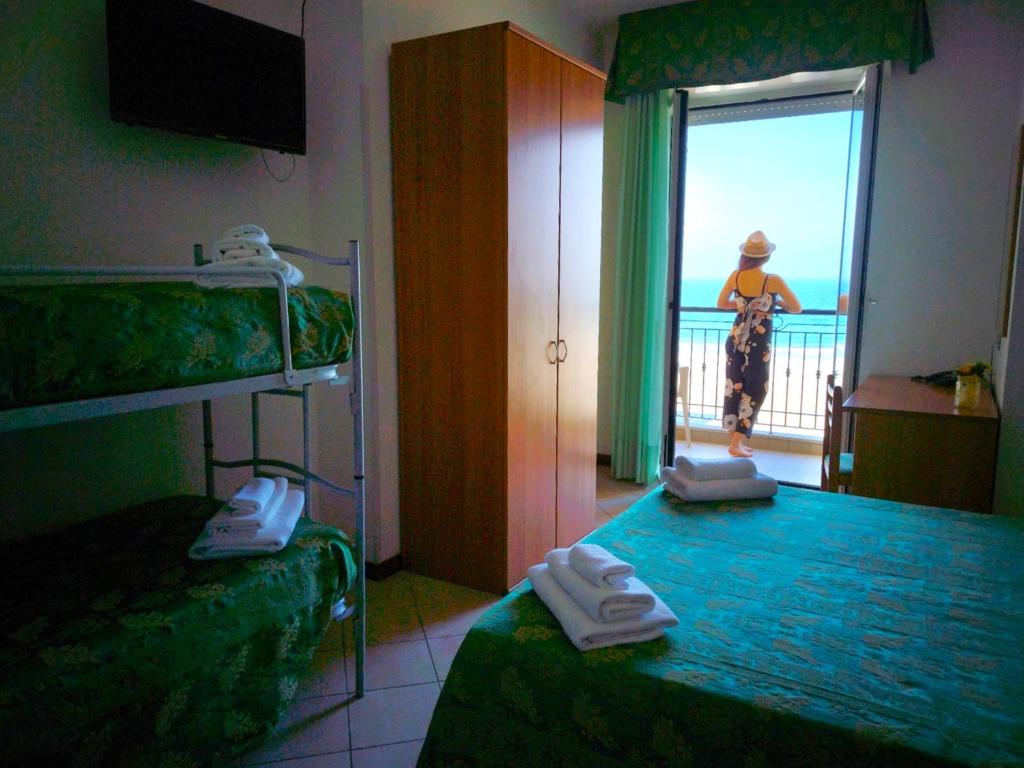 Postel nebo postele na pokoji v ubytování Hotel Belvedere