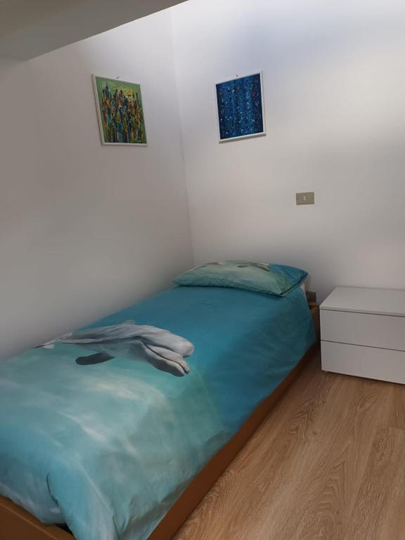 Postel nebo postele na pokoji v ubytování LaPimpaLUINO
