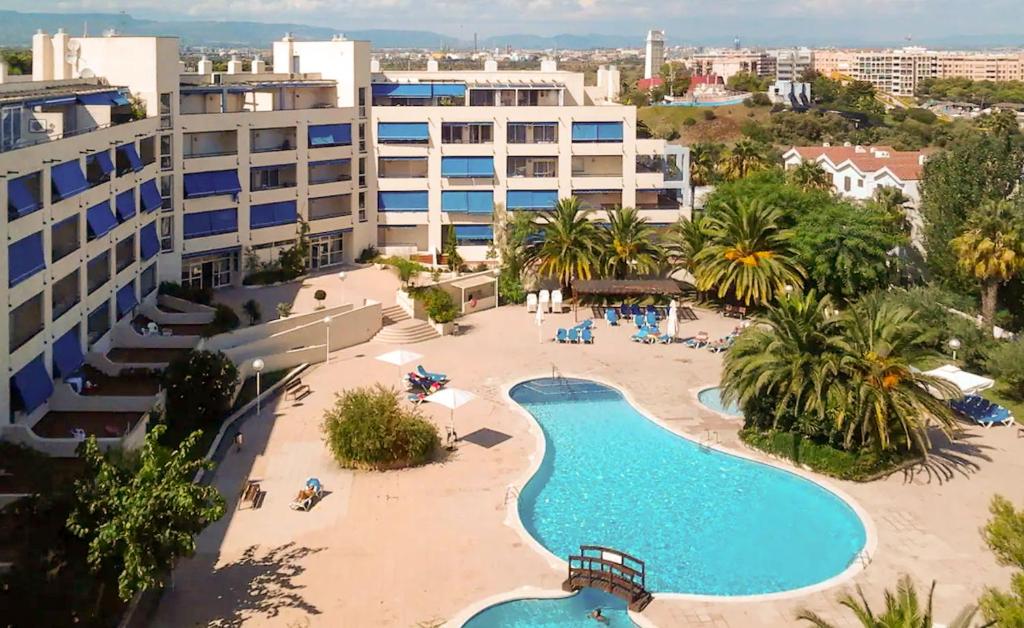 an aerial view of a resort with a swimming pool at Bga rentals Punta Prima in La Pineda
