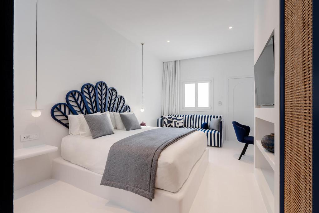 A bed or beds in a room at Croco Mykonos