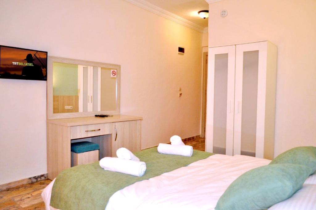 Postel nebo postele na pokoji v ubytování Native Hotel