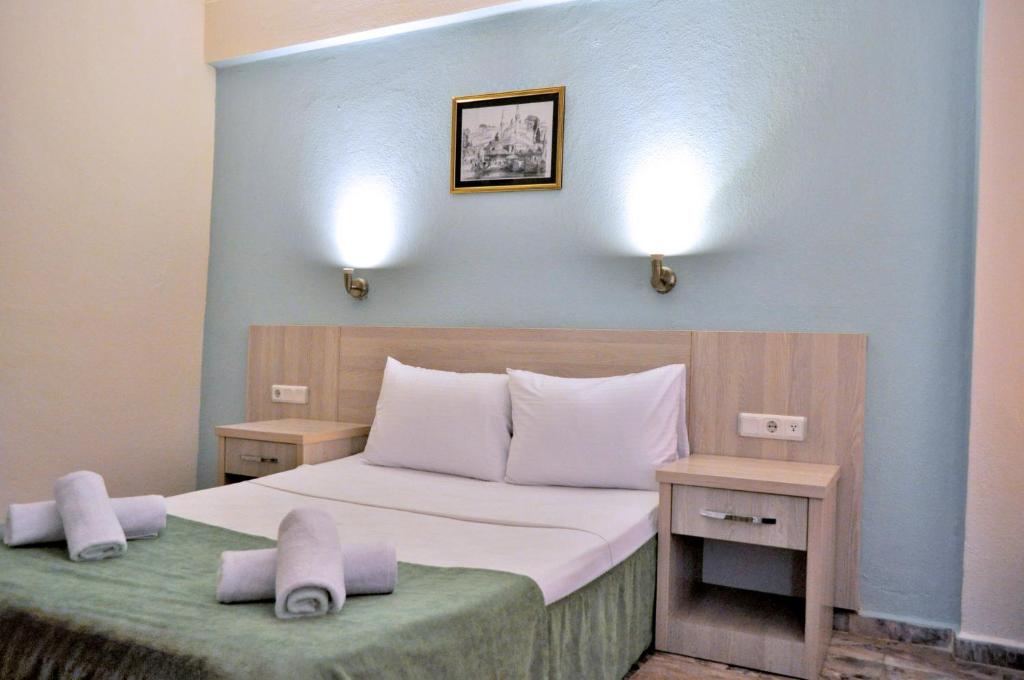 Postel nebo postele na pokoji v ubytování Native Hotel