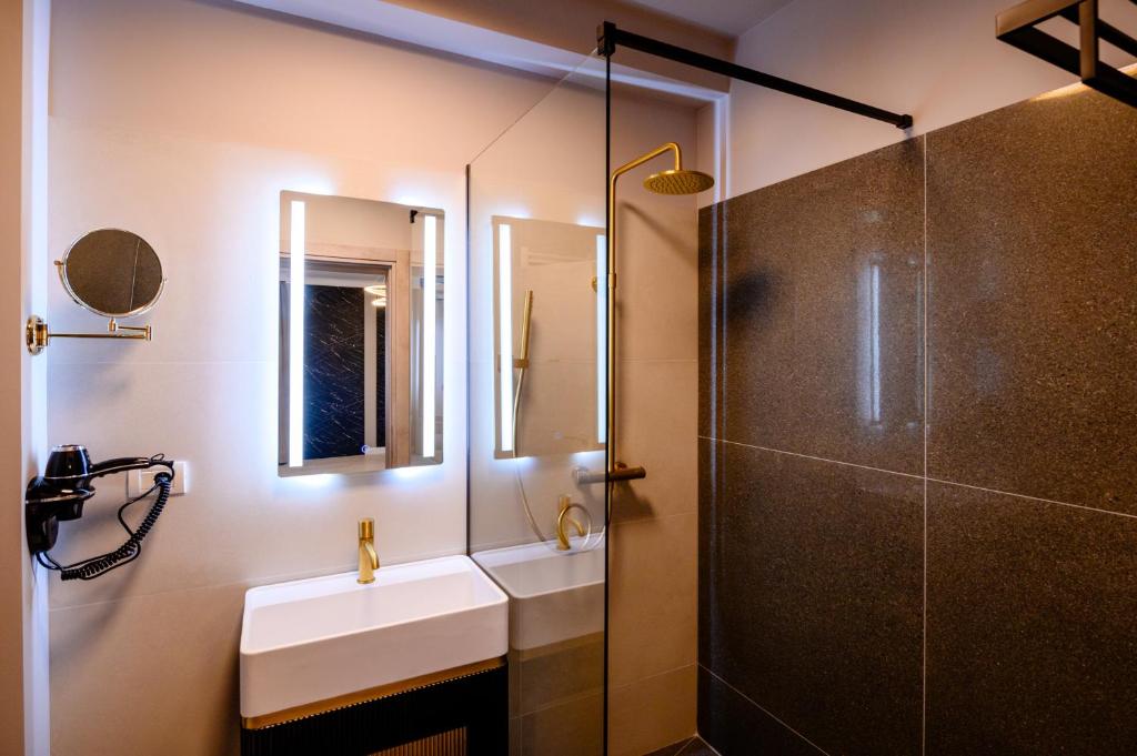 Koupelna v ubytování Elitte Inn & Suites