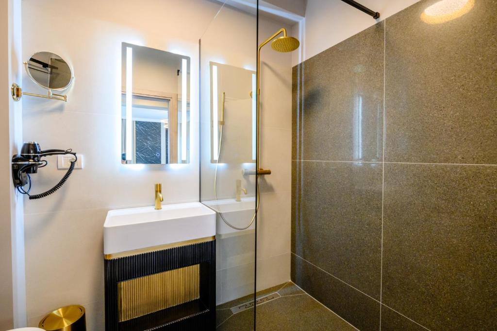 Koupelna v ubytování Elitte Inn & Suites