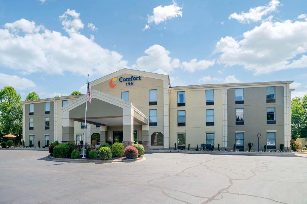 a rendering of a hotel with a building at Comfort Inn Asheville Airport in Fletcher